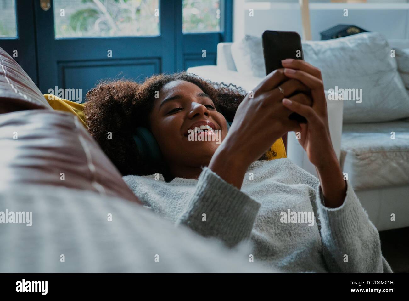 African woman laughing exciting hi-res stock photography and images - Alamy