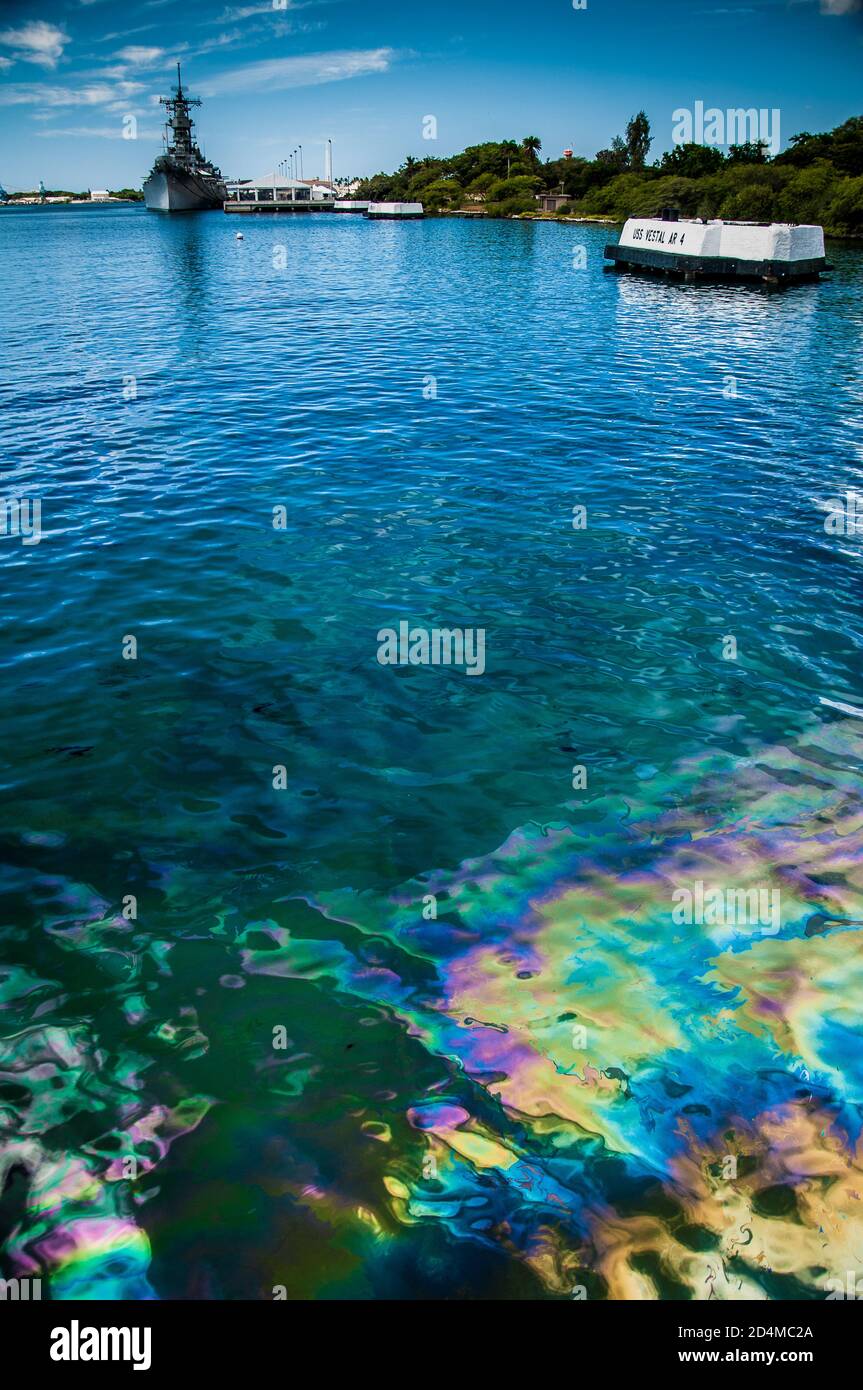 USS Arizona Memorial with leaking oil from the Arizona fuel tanks Stock