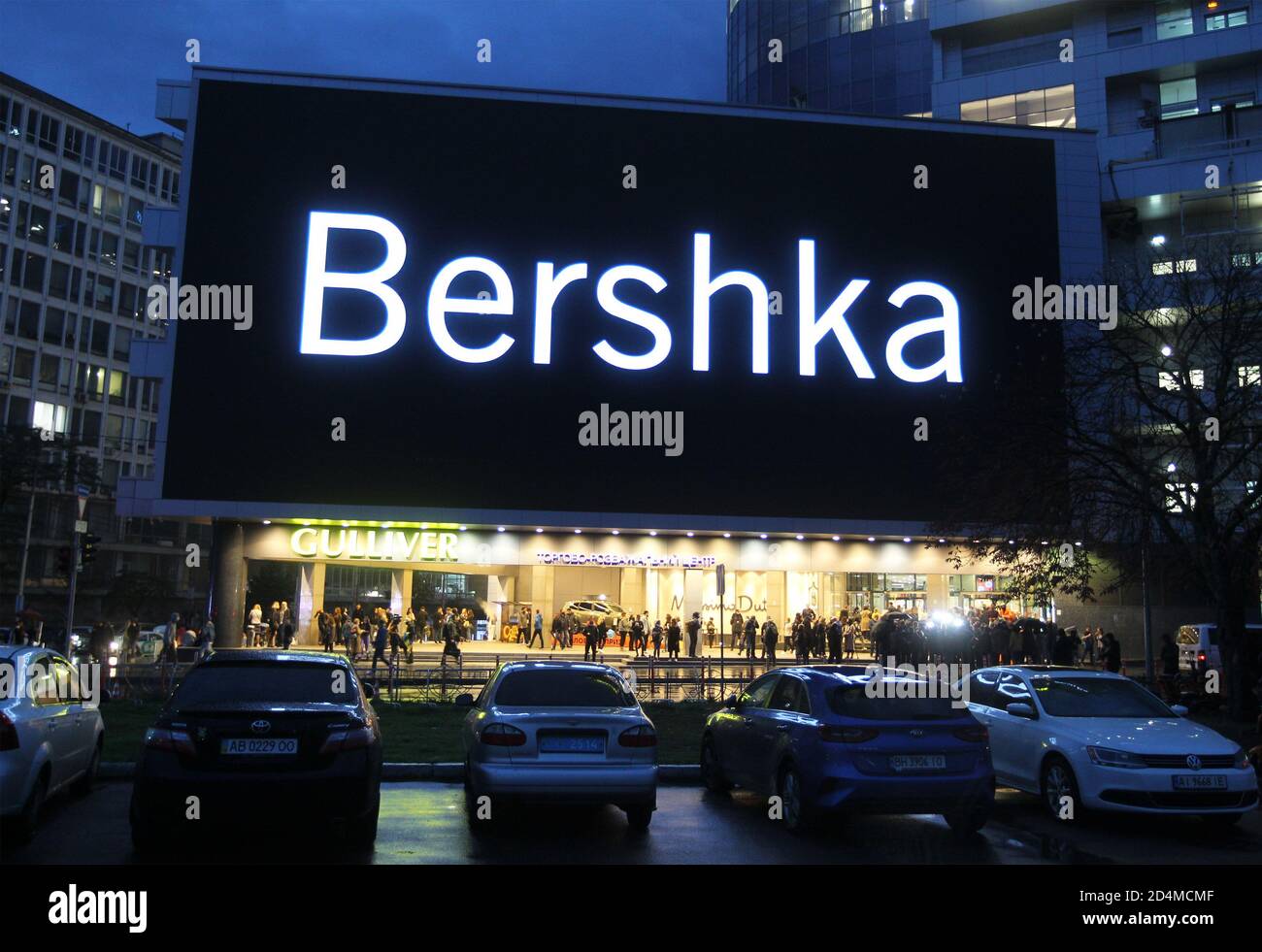 A huge screen shows the logo Bershka on a shopping mall building in downtown Kiev. Stock Photo