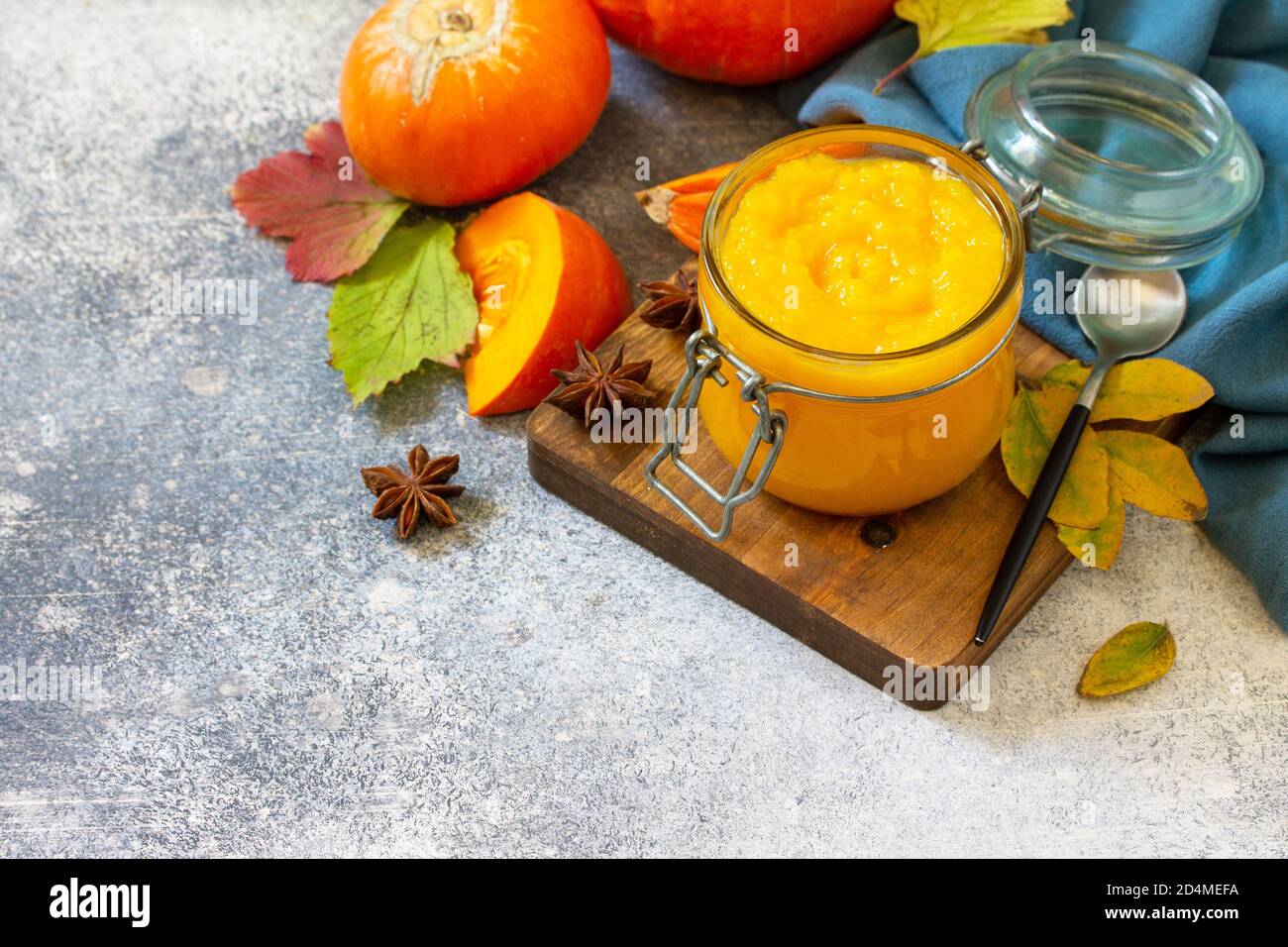 Autumn pumpkin meals for thanksgiving day. Pumpkin Puree on a slate background. Copy space. Stock Photo