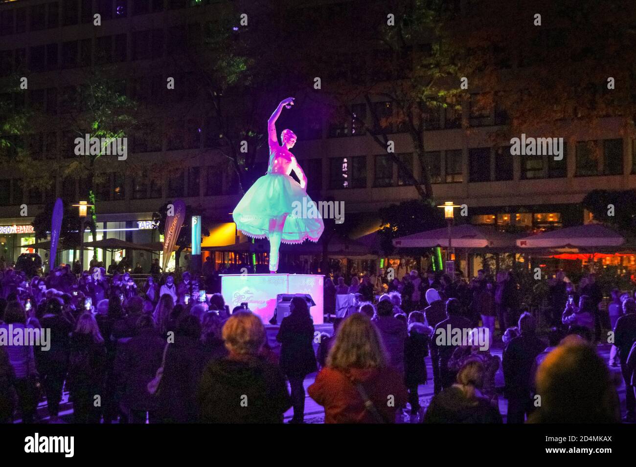 Essen, NRW, Germany. 09th Oct, 2020. Installation 5, "Licht bei der  Nacht"/Prima Ballerina by Richard Roehrhoff, sees a delicate ballerina  dancing in the middle of Kennedy Square, transforming it into a giant