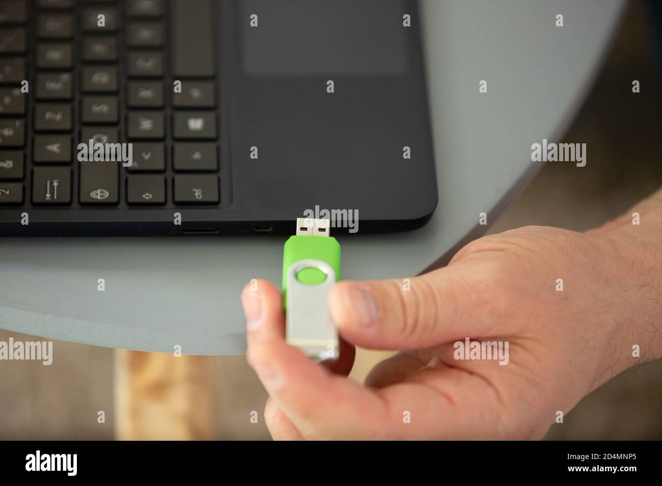 connecting a pendrive in a laptop on a desktop Stock Photo Alamy