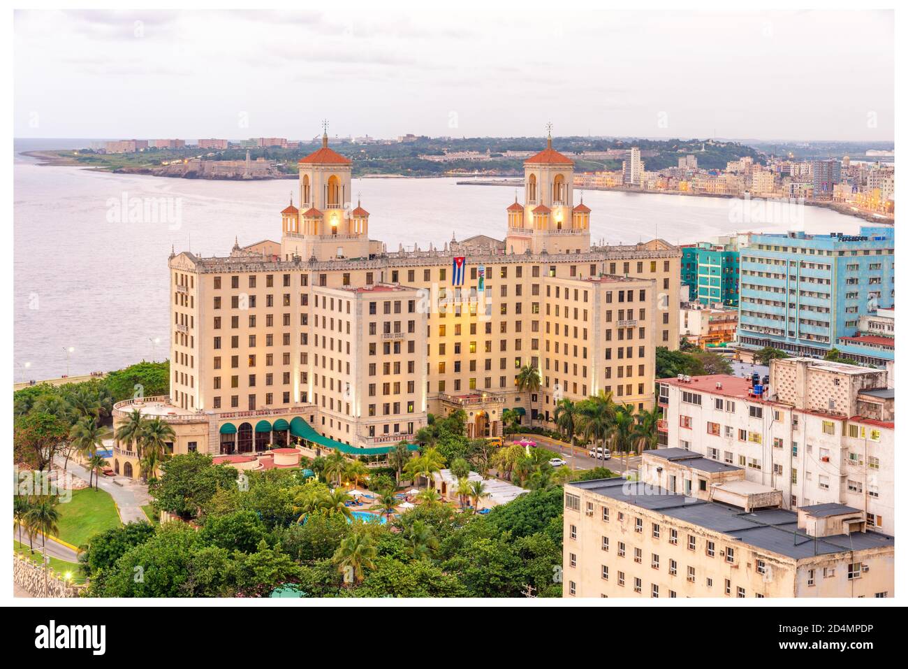 Arial view of Havana at sunset with several landmarks and the ocean Stock Photo