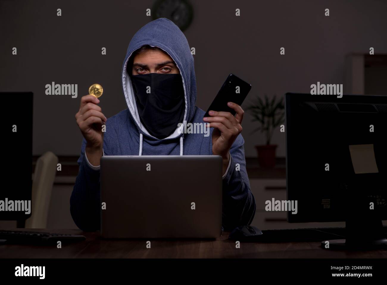 Firewall Hacker User Male hacker hacking security firewall late in the office Stock Photo ...