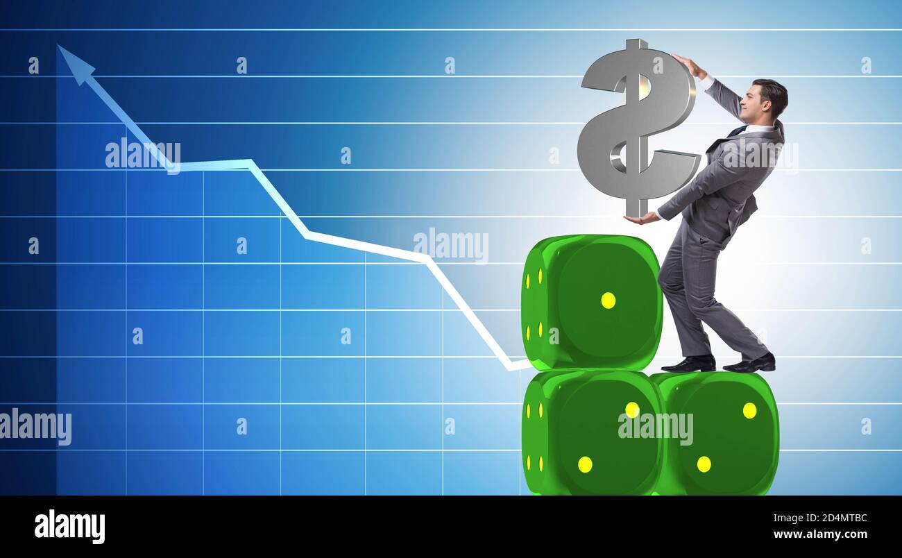 The businessman holding dollar sign on top of dice pyramid Stock Photo ...