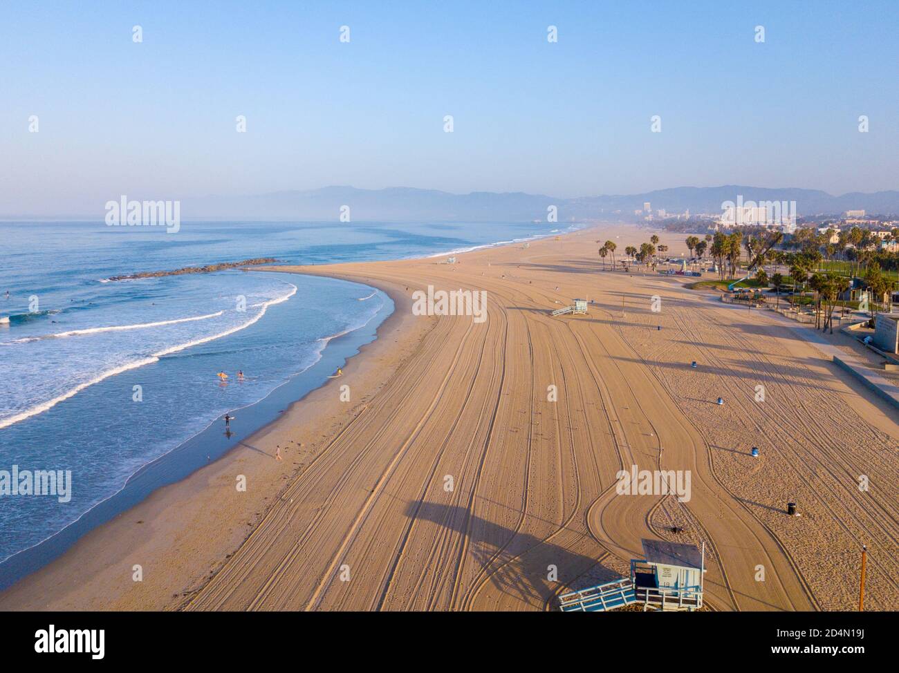 Drone view of the Venice beach surrounded by the sea and buildings in ...