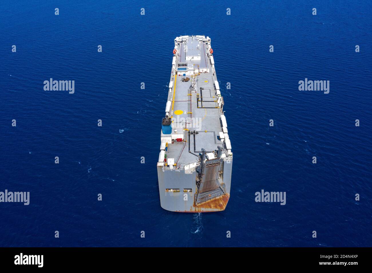 RoRo Roll on-Off vessel cruising slowly towards a commercial port Stock Photo