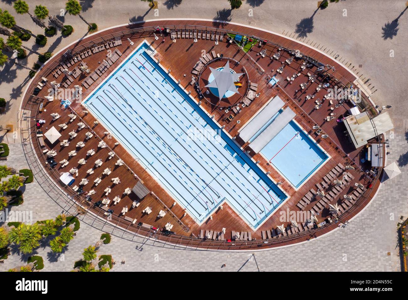 Empty Swimming pool compound during October, Covid19 second outbreak, Aerial view. Stock Photo