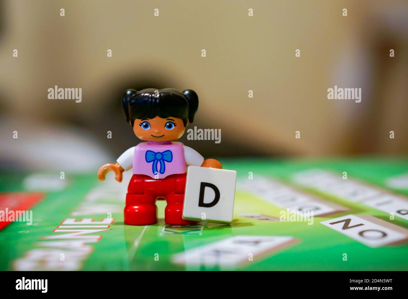 POZNAN, POLAND - Oct 06, 2020: Lego Duplo girl figurine holding a brick  with the letter D Stock Photo - Alamy