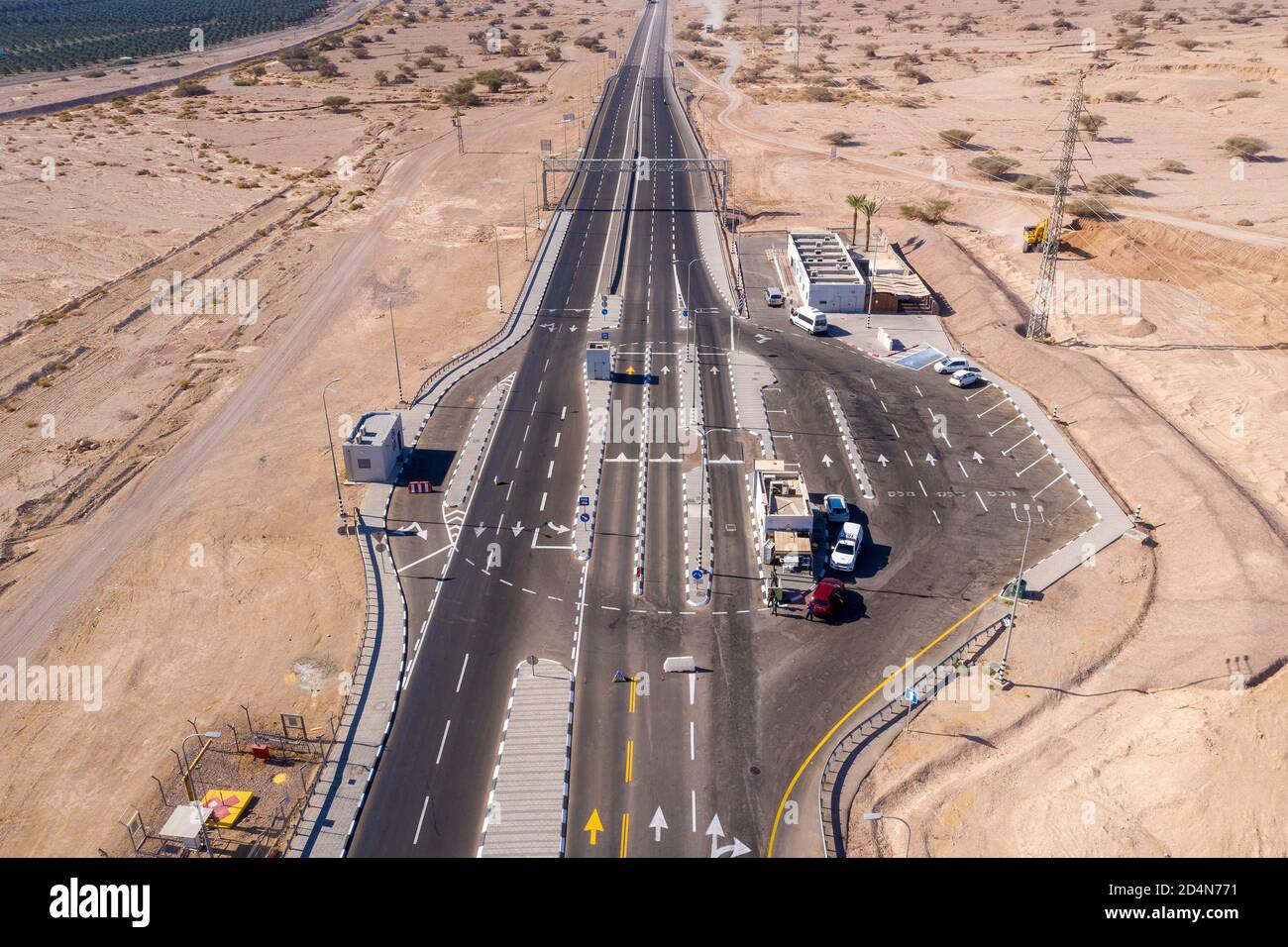 Eilat free trade zone customs checkpoint with traffic approaching, Aerial view Stock Photo