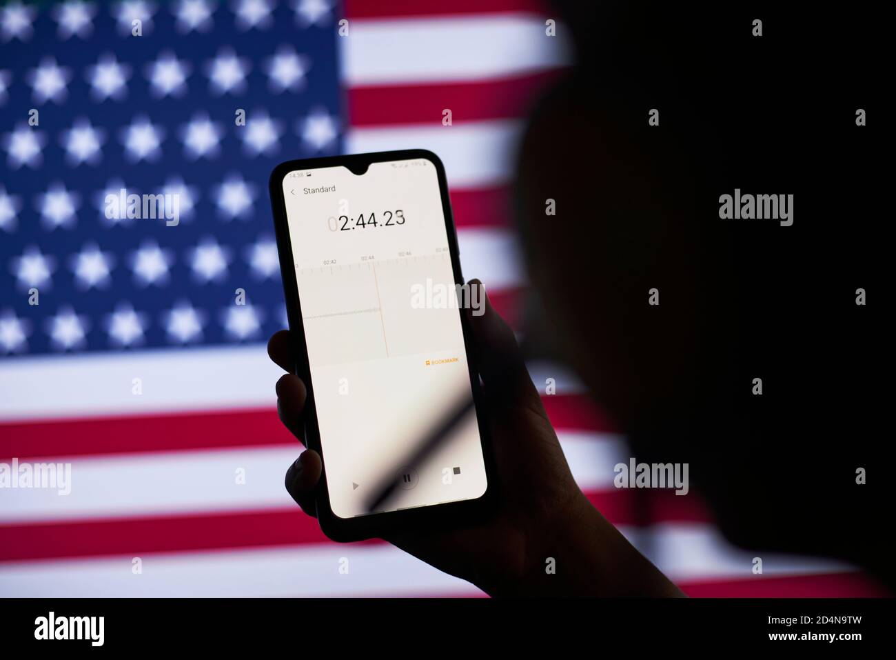 US Secret Service officer recording diplomatic conversations with special listening device Stock Photo