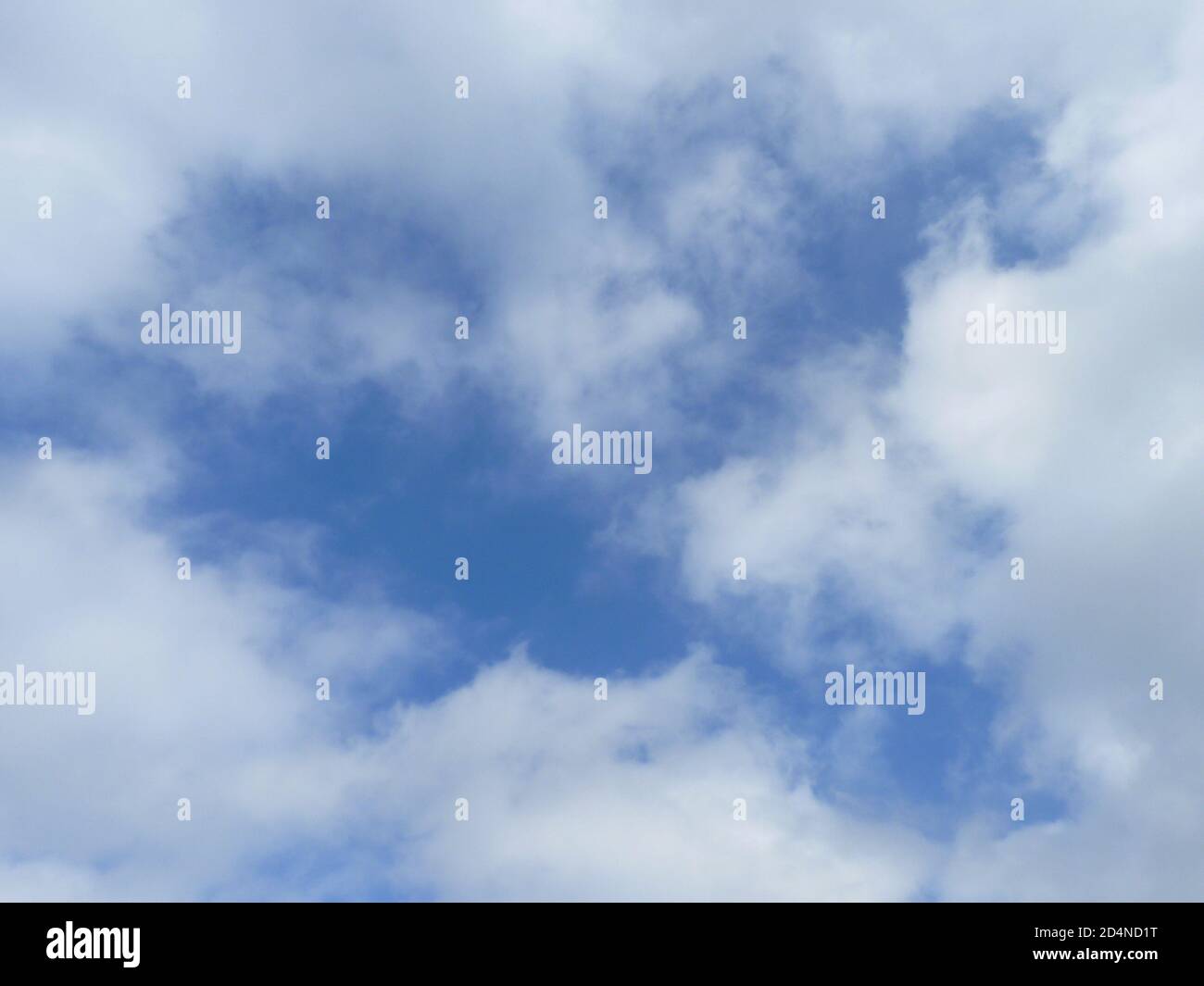 Beautiful fluffy clouds in the blue sky - great for wallpapers Stock ...