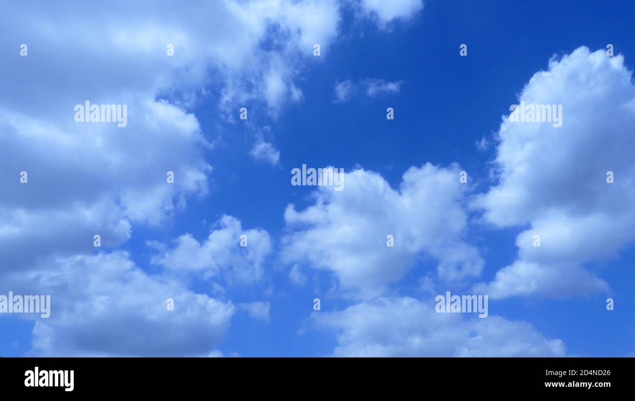 Beautiful fluffy clouds in the blue sky - great for wallpapers Stock ...