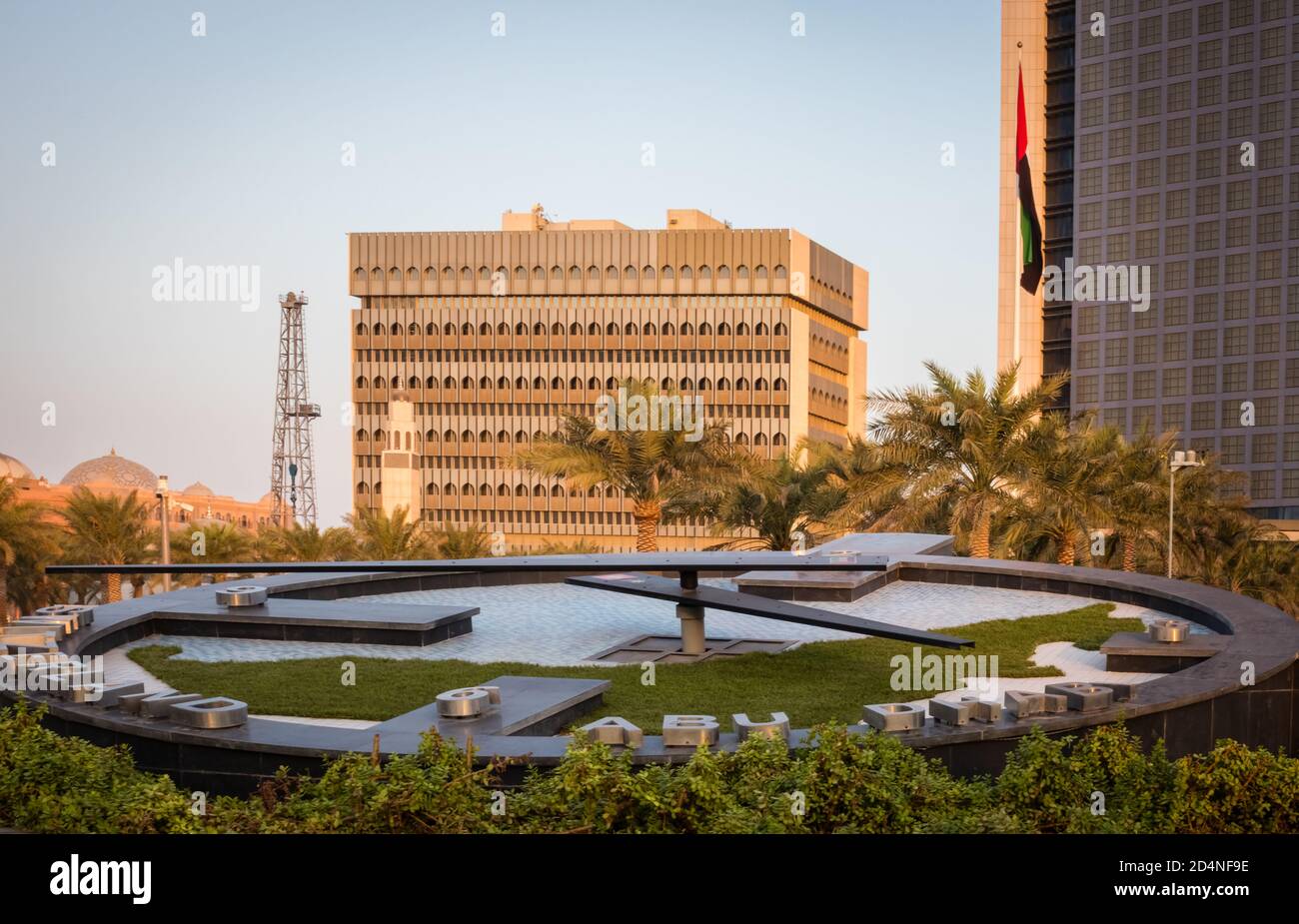 Abu Dhabi , UAE - 10 october 2020 : Capital City of United Arab Emirates with emirates flag, etihad towers, ADNOC head office,emirates palace and city Stock Photo