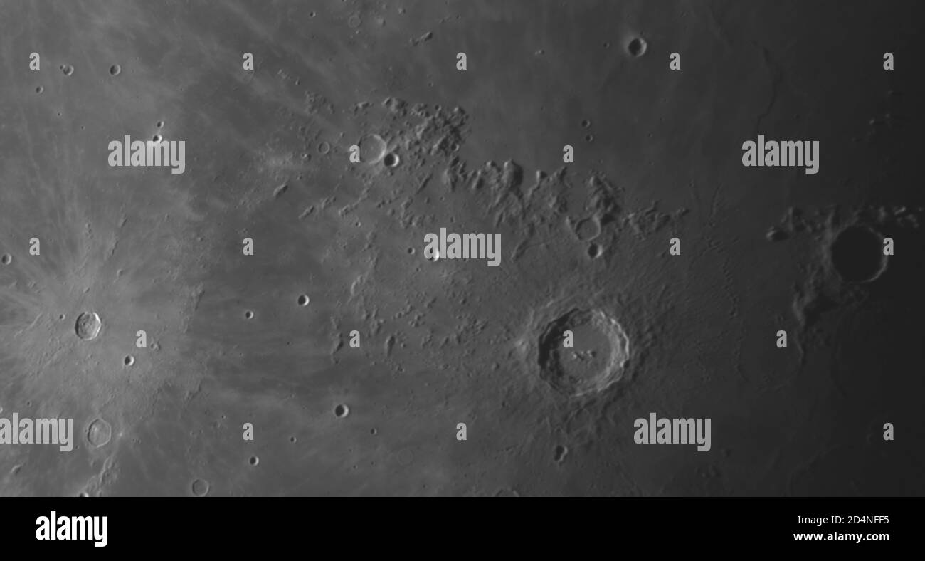 London, UK. 10 October 2020. Detailed images of the Moon are captured in very clear sky with no light pollution before dawn, and before clouds roll in after sunrise. Image: Crater Copernicus is bordered to the north by the Montes Carpatus mountain range with crater Eratosthenes towards right edge of frame and Mare Imbrium top of frame with the smaller crater Pytheus. Crater Kepler to left of frame with a large system of rays. Credit: Malcolm Park/Alamy Stock Photo