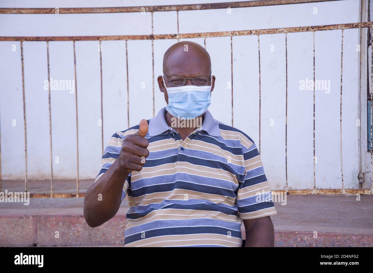 Thumbs up middle aged african hi-res stock photography and images - Alamy