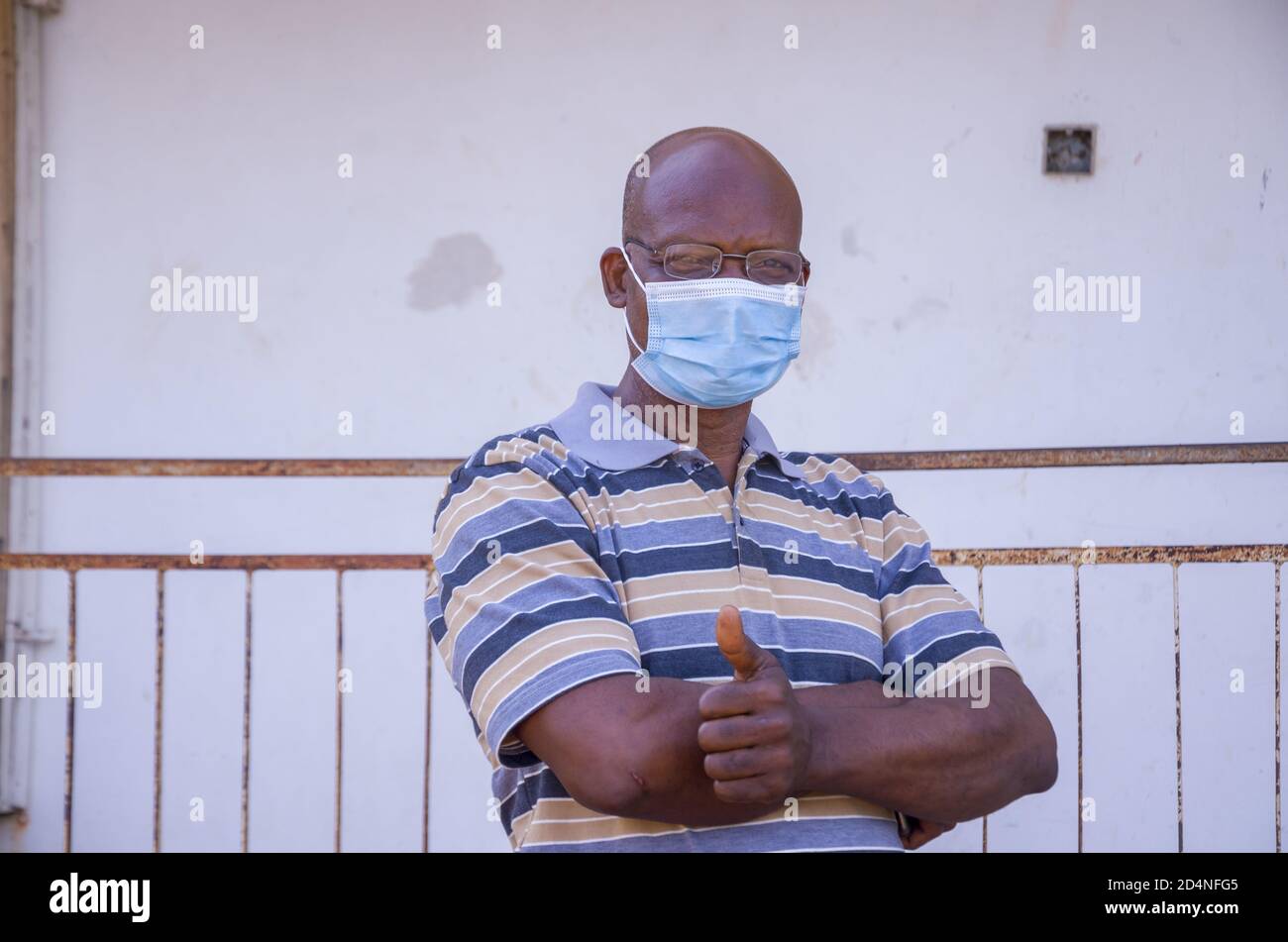 Thumbs up middle aged african hi-res stock photography and images - Alamy