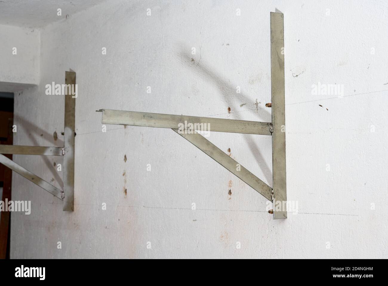 A close-up of the triangle frame on the wall Stock Photo - Alamy