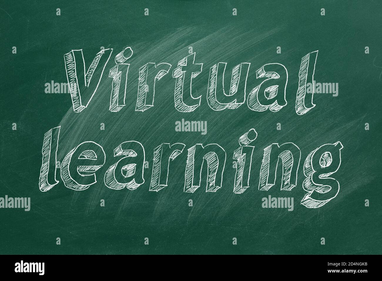Hand drawing 'Virtual learning' on green chalkboard Stock Photo