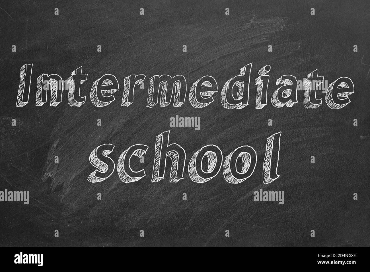 Hand drawing 'Intermediate school' on black chalkboard Stock Photo