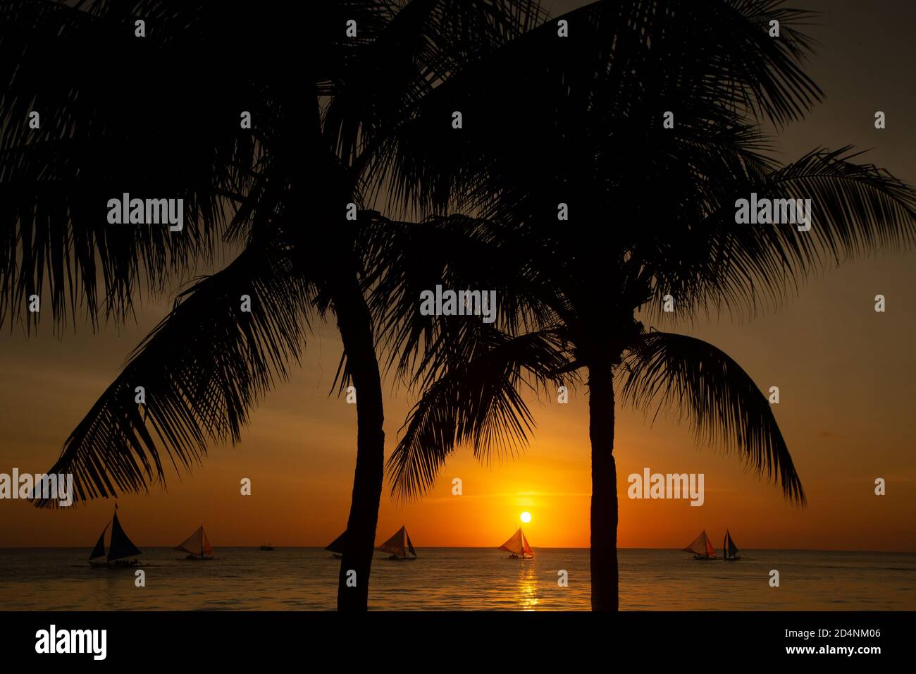 Sunset on the beach Stock Photo - Alamy