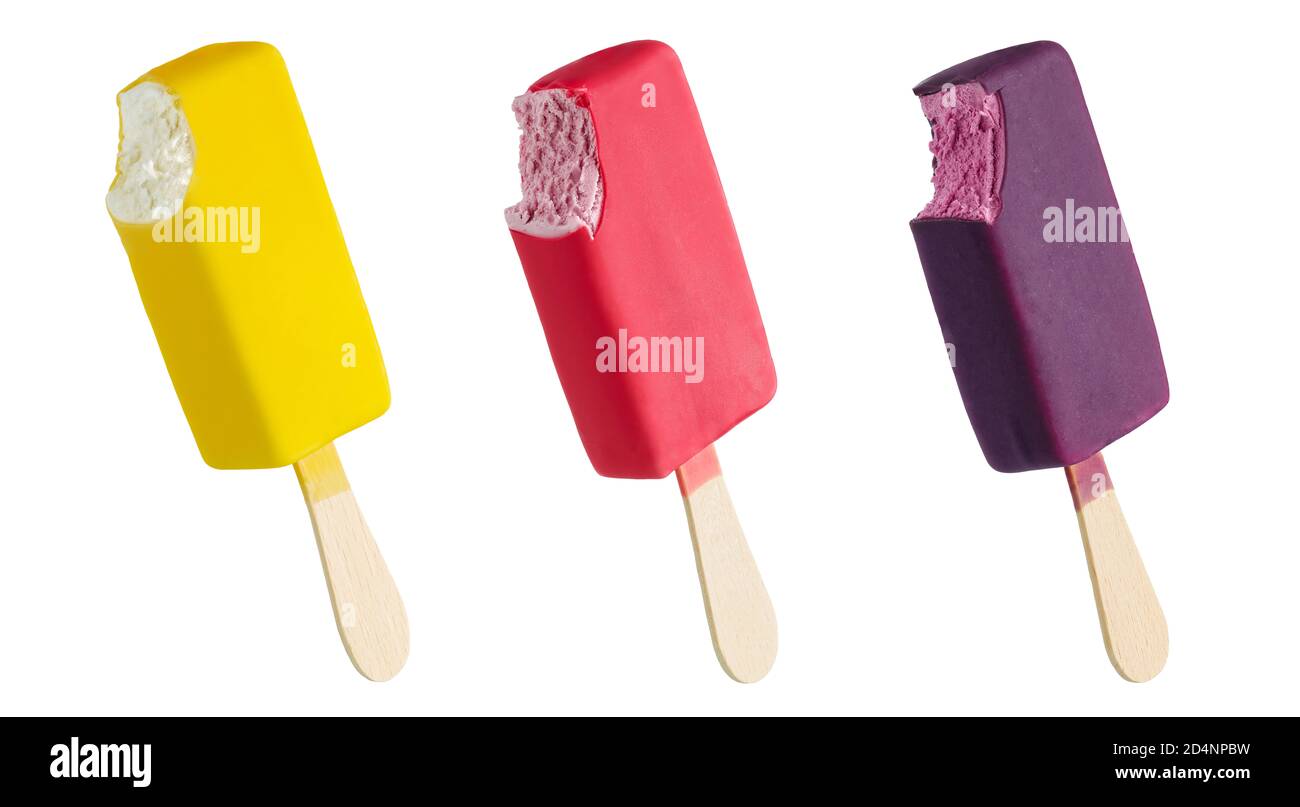 Bitten yellow, pink and purple ice cream bars on a stick isolated on white background; full depth of field Stock Photo