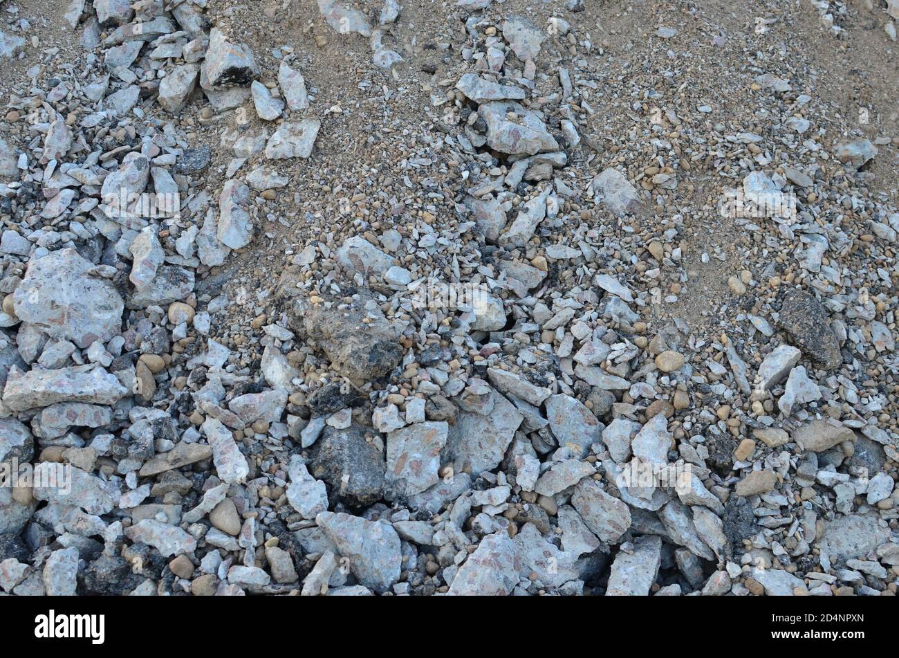 Recycled concrete aggregate (RCA) which is produced by crushing concrete reclaimed from concrete buildings, slabs, bridge decks, demolished highways. Stock Photo