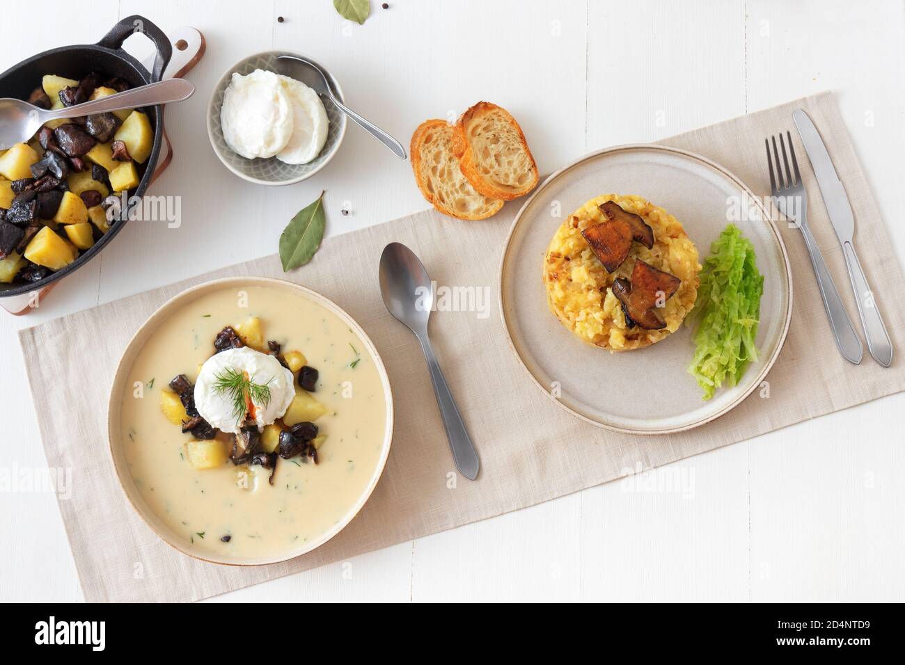 Fresh roasted boletus with mashed potatoes and kale. Thick creamy soup with fresh forest mushrooms. Favorite season mushroom lunch or dinner in Czech Stock Photo