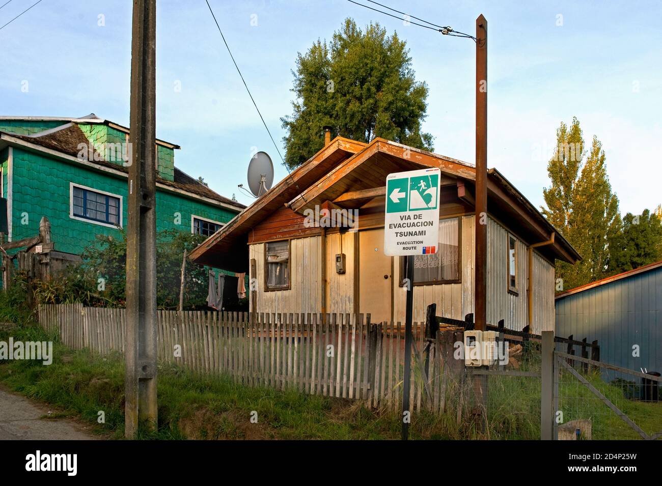 Lemuy Island, Chiloé Archipelago/ Chile - March 25 2014: Street sign 'Evacuation route tsunami' in Ichuac Stock Photo