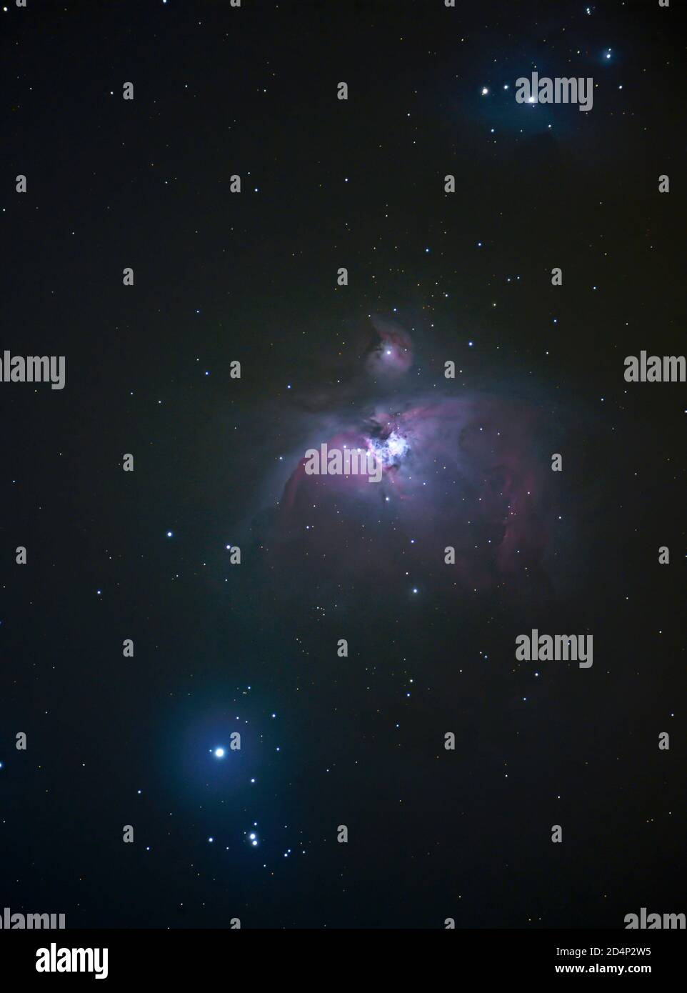 The Orion Nebula, M42, a diffuse nebula photographed from London, UK, 10 October 2020 with multiple long exposures with standard Nikon Z7 camera and 5' refracting telescope. Also visible is M43 and (top) NGC 1977, The Running Man Nebula. The blue star lower left is double star Nair al Saif. The Orion Nebula is approx 1,600 light years from planet Earth. Credit: Malcolm Park/Alamy. Stock Photo