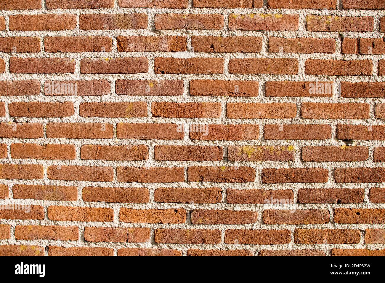 Brown stone brick wall texture background Stock Photo - Alamy