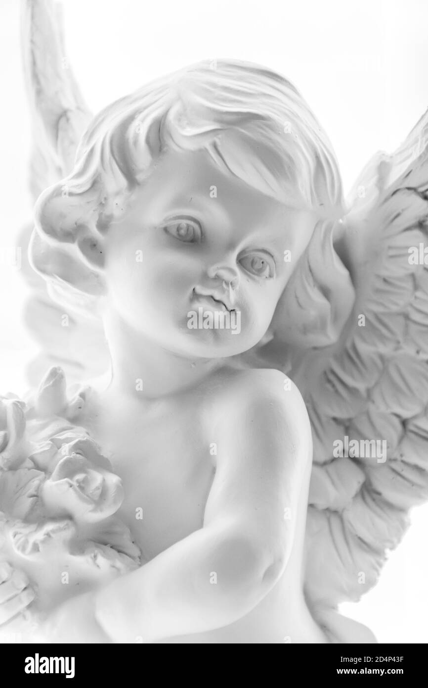A close up of a gypsum angel statue for home. Stock Photo