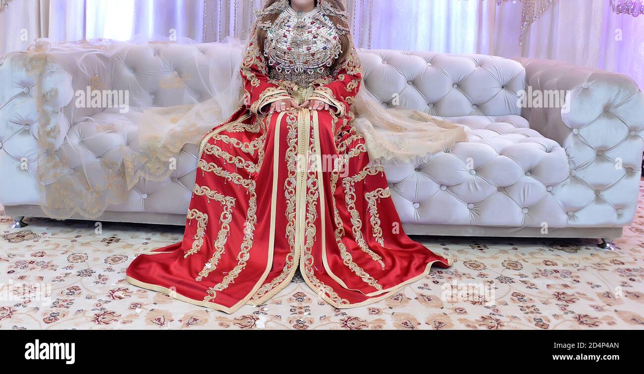 The Moroccan caftan is a Moroccan women's traditional costume. It is considered one of the oldest traditional clothes in the world. Stock Photo