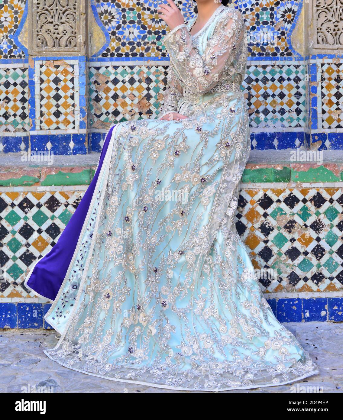 The Moroccan caftan is a Moroccan women's traditional costume. It is considered one of the oldest traditional clothes in the world. Stock Photo