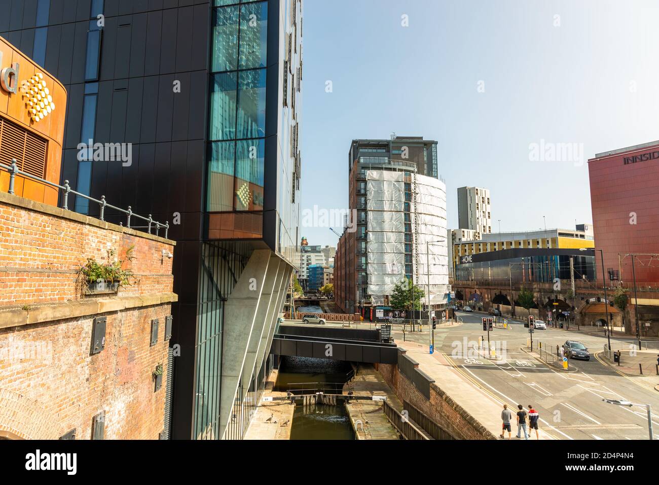 Street view with the canal at Deansgate Locks in Manchester city centre