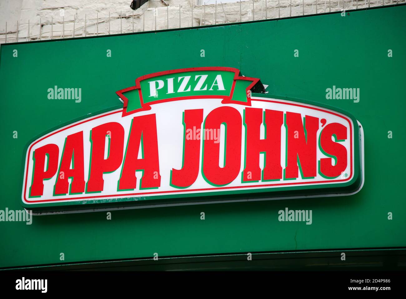 Papa John's Logo seen outside its store branch in London Stock Photo