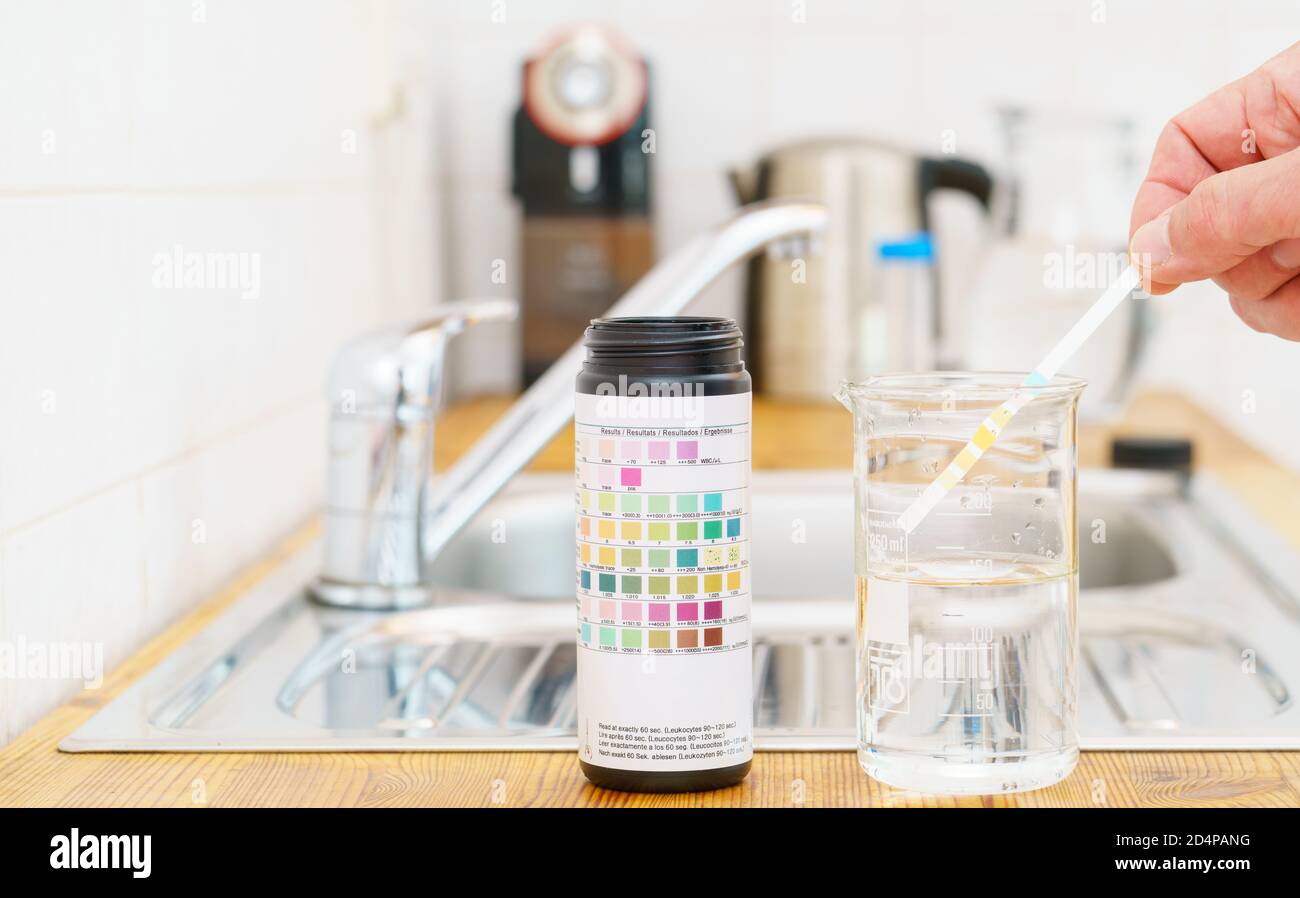 Checking the quality of tap water with a water test kit Stock Photo Alamy