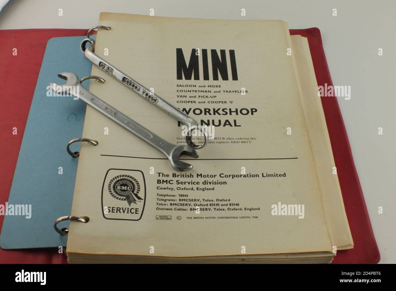 1960s Inside cover of the Mini official work shop manual, BMC service manual with mechanics tools Stock Photo
