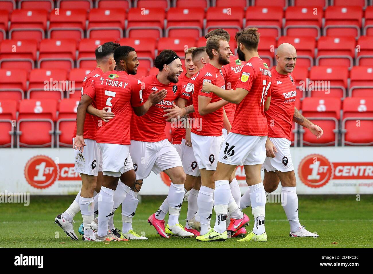 Richie Towell of Salford City (headband, 3rd left) celebrates with his teammates after scoring his teams 1st goal. EFL Skybet Football league two match, Salford City v Tranmere Rovers at The Peninsula Stadium in Salford, Greater Manchester on Saturday 10th October 2020. this image may only be used for Editorial purposes. Editorial use only, license required for commercial use. No use in betting, games or a single club/league/player publications.pic by Chris Stading/Andrew Orchard sports photography/Alamy Live News Stock Photo