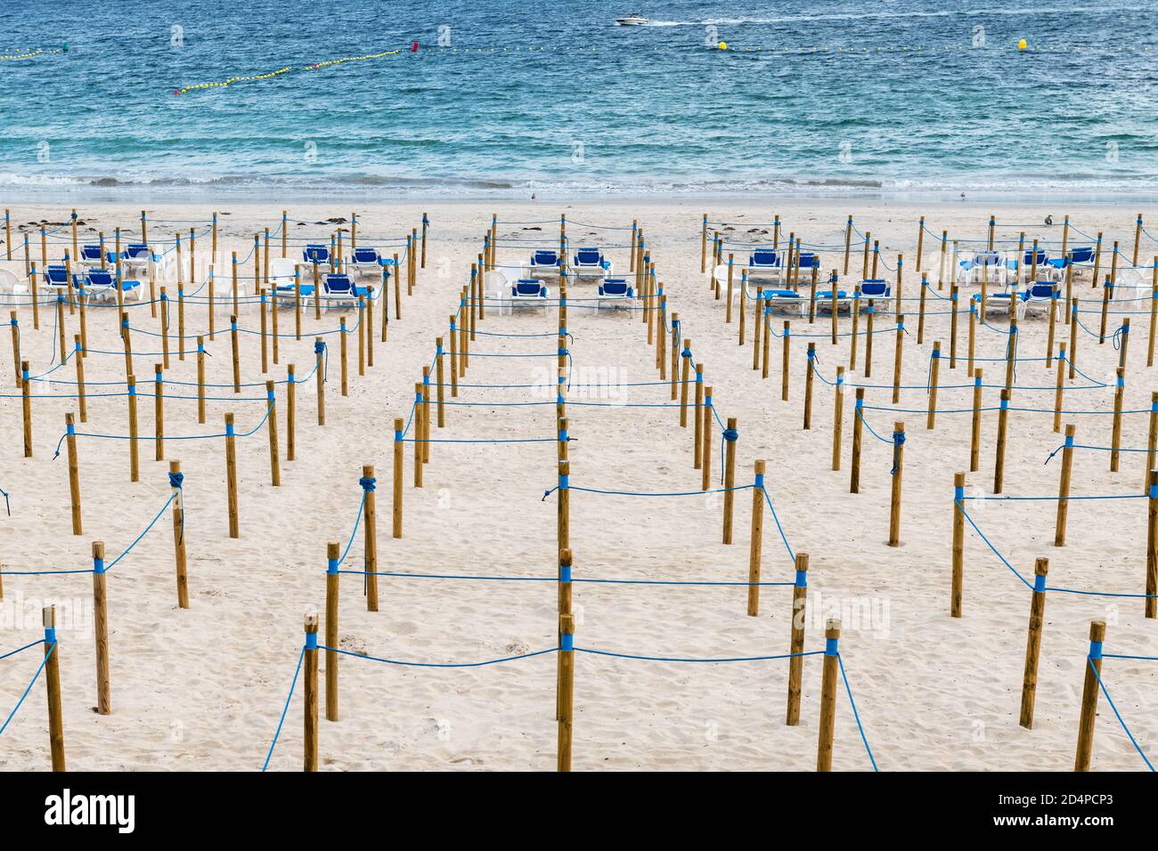 SANXENXO, SPAIN - AUGUST 18, 2020: Empty Silgar beach in Sanxenxo during the outbreak of the Covid 19 virus, with the protection measures in place to Stock Photo