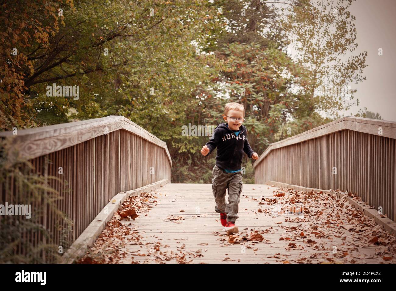 Kids walking wood bridge hi-res stock photography and images - Alamy