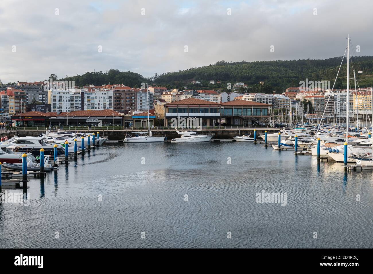 SANXENXO, SPAIN - AUGUST 18, 2020: Small sailing boats moored in the yacht club of Sanxenxo on a clear Summer day, Pontevedra, Spain. Stock Photo