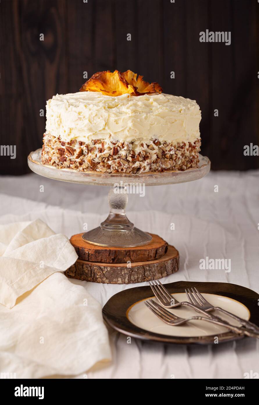 Homemade hummingbird cake with pineapple flowers on top with copy space Stock Photo Alamy