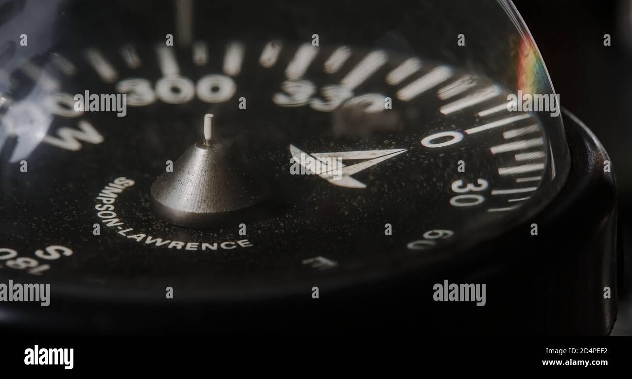 Close up Of A Glass Domed Oil Filled Ships Compass Showing Central