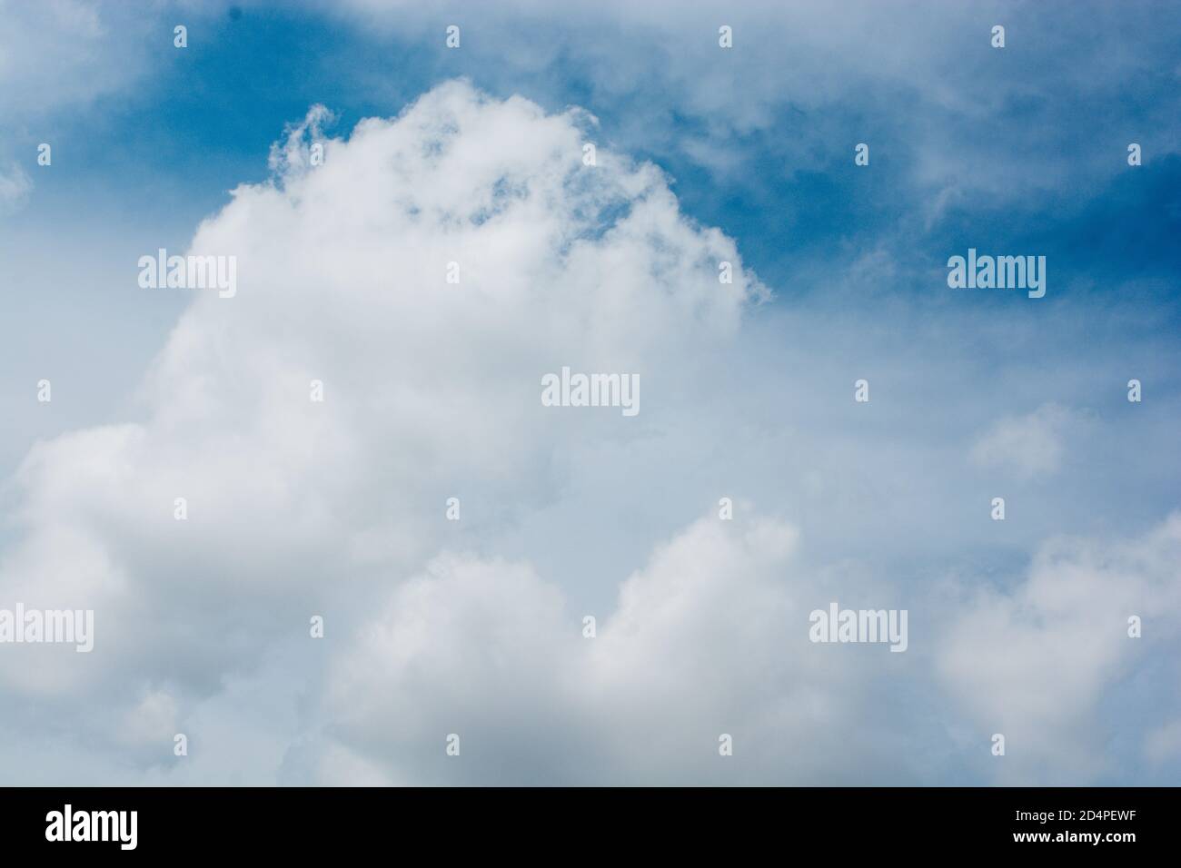 Sky background with fluffy clouds Stock Photo - Alamy