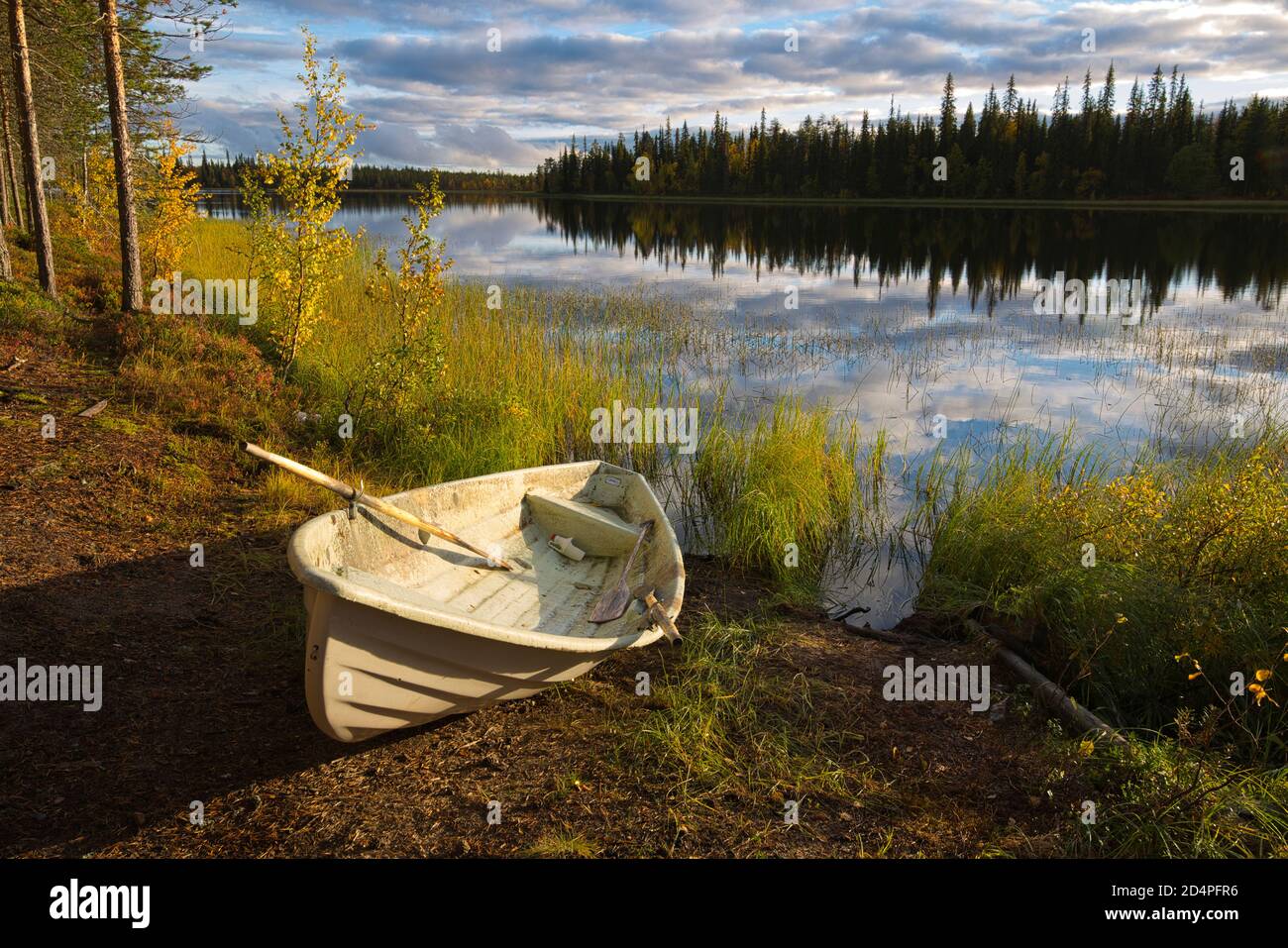 Row boat at Harjujärvi in Muonio,Lapland, Finland Stock Photo