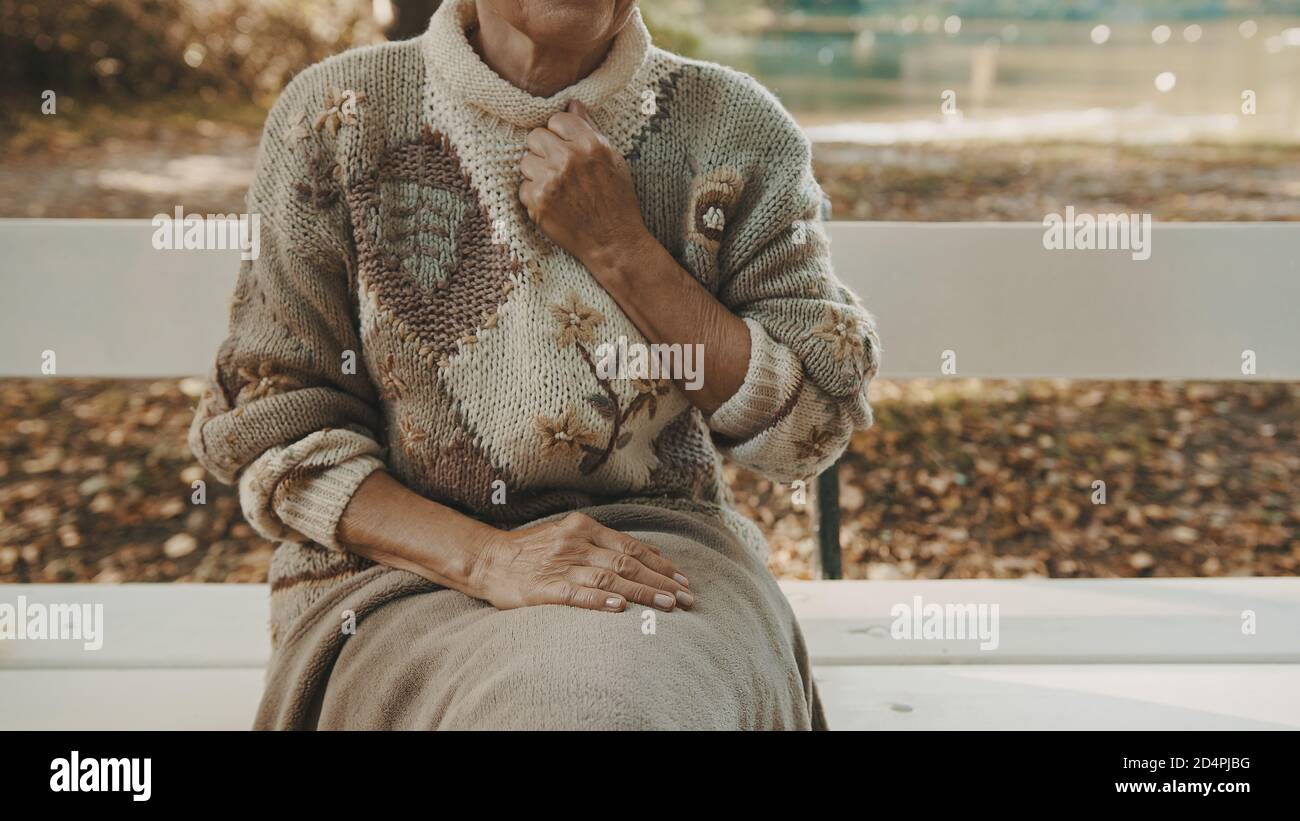 Sad woman hand over chest hi-res stock photography and images - Alamy