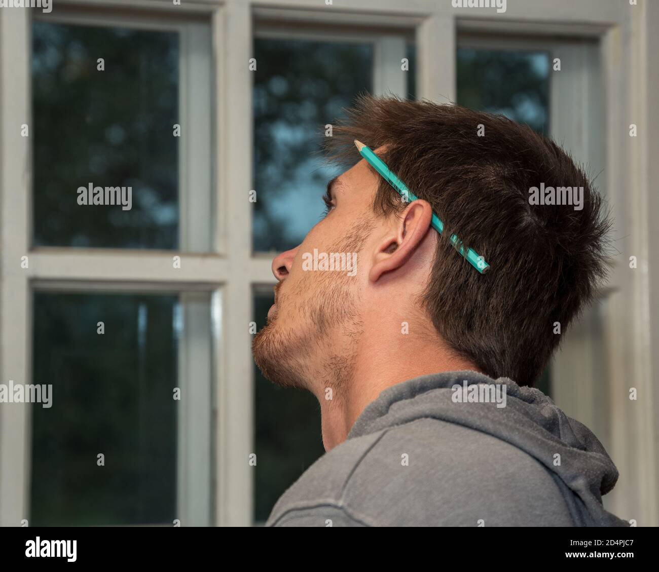 Pencil behind ear hires stock photography and images Alamy