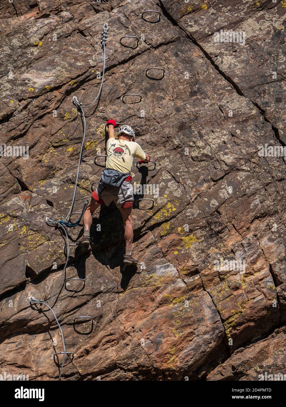 Climber tackles the Ouray Via Ferrata, Ouray, Colorado. Stock Photo