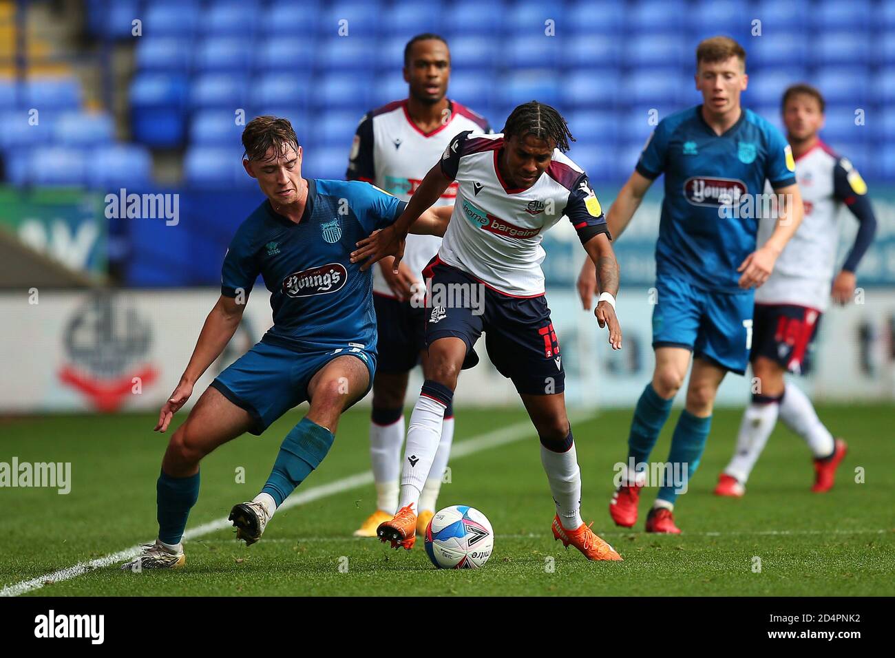 Boltons Jamie Mascoll battles with Grimsbys Terry Taylor during the Sky Bet League 2 match between Bolton Wanderers and Grimsby Town at the Reebok Stadium, Bolton on Saturday 10th October 2020. (Credit: Chris Donnelly | MI News) Credit: MI News & Sport /Alamy Live News Stock Photo